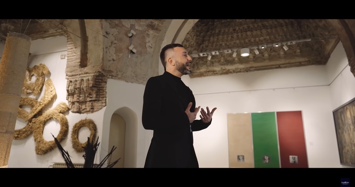 Кадър Youtube Васил Гарванлиев Here I standБългарското знаме се появява в